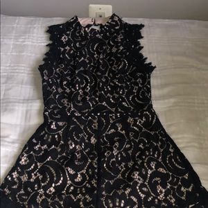 Francesca’s lace open back romper